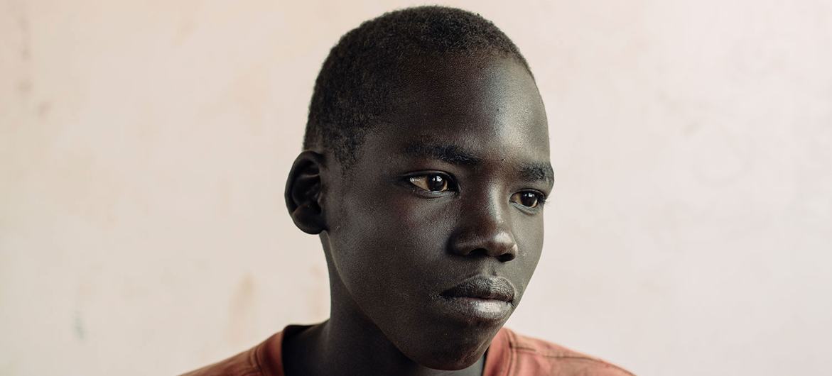 Kennedy, 13, displaced to Uganda. He is among the 2.3 million South Sudanese refugees that fled the outbreak of civil war.