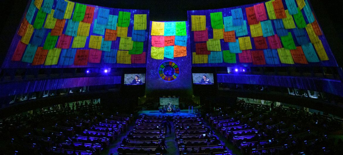 A wide view of projections in the General Assembly Hall as Prime Minister Mia Amor Mottley (on screen) of Barbados and SDG Advocate Co-Chair, addresses the SDG Moment 2022.
