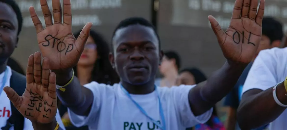 Young activists at COP27 in Sharm El-Sheikh demanding that developed nations 'pay up' for loss and damage due to climate change.