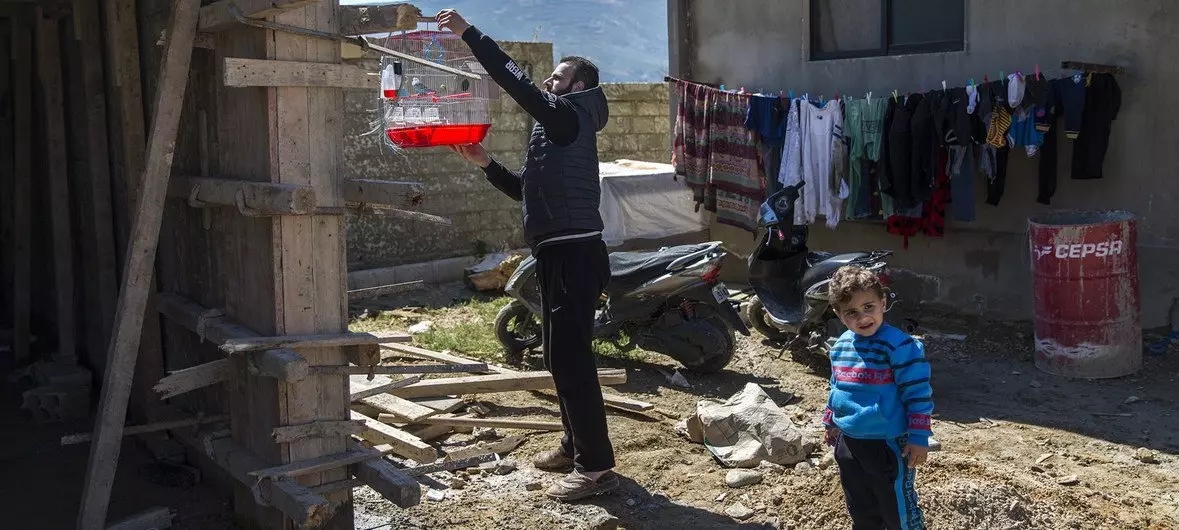 A Syrian family who had fled from their hometown near Homs, settled temporarily in Lebanon. A Syrian family who had fled from their hometown near Homs, settled temporarily in Lebanon.