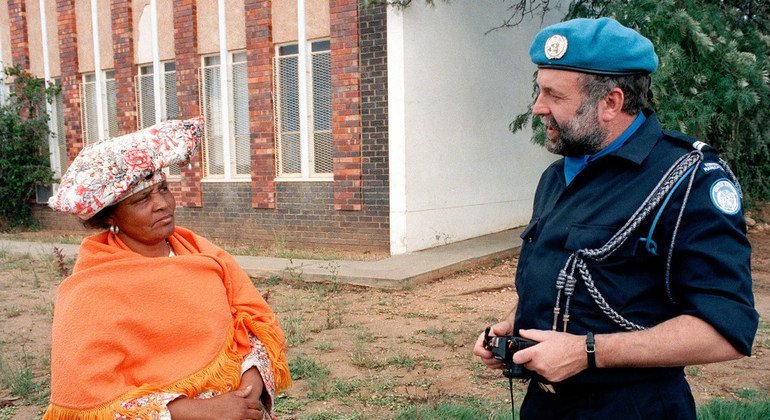The Netherlands sent 60 police monitors to Namibia, such as the one seen here speaking to a resident in Windhoek, to serve with the UN Transition Assistance Group (UNTAG).