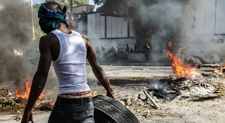 People are protesting on the streets of Port-au-Prince in crisis-torn Haiti. People are protesting on the streets of Port-au-Prince in crisis-torn Haiti.