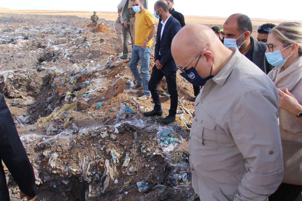 ICC Prosecutor Karim Khan visits the landfill site in Tarhunah, Libya, where over 250 have been identified across a number of mass graves.