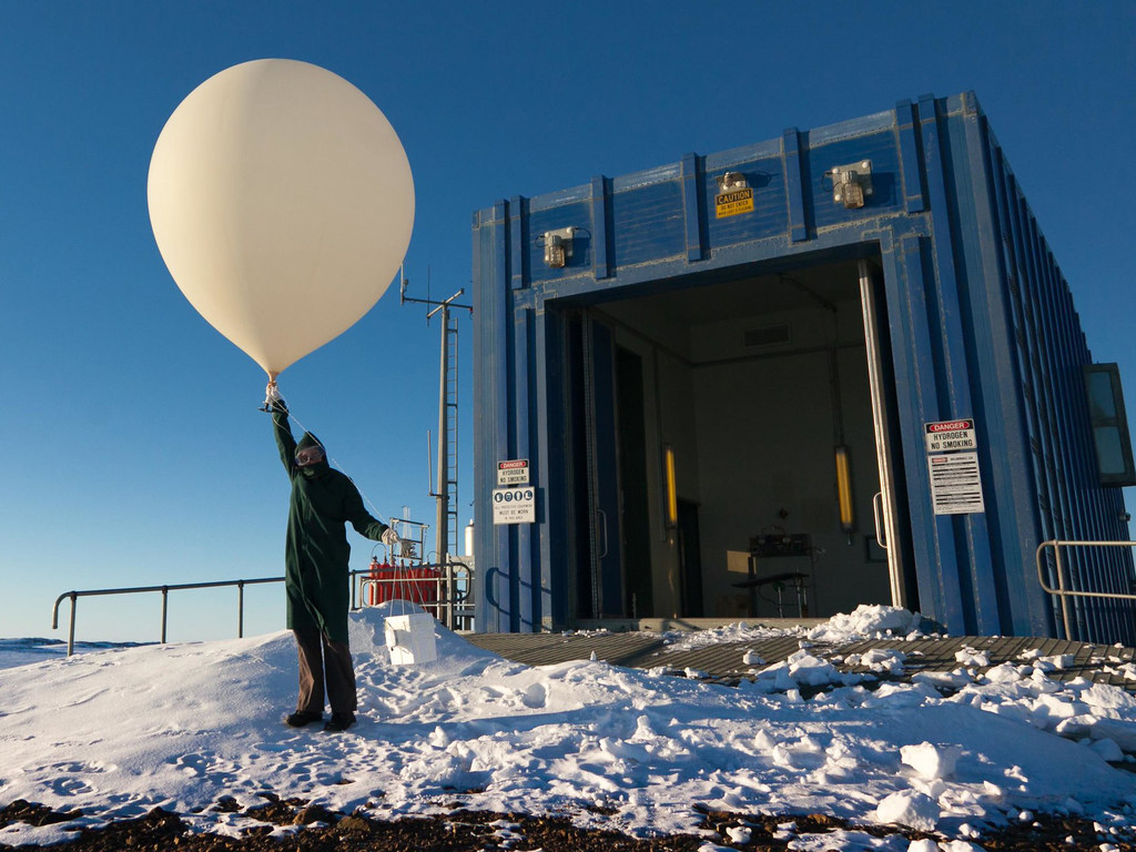 A weather balloon is prepared for release at an Australian Antarctic station.