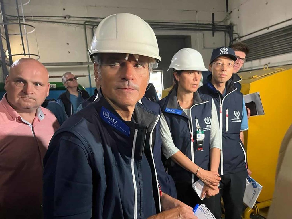 IAEA Director-General Rafael Mariano Grossi (second left) and the IAEA expert mission team arrive at the Zaporizhzhya Nuclear Power Plant in Ukraine.