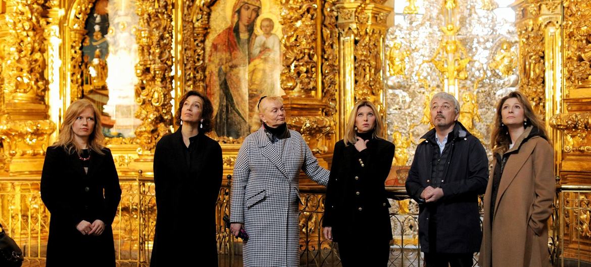 UNESCO Director-General Audrey Azoulay (2nd left) visits a church in Ukraine.