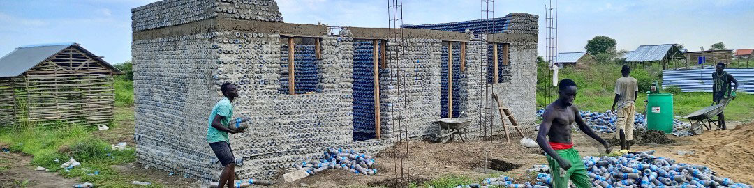 Building essential structures in South Sudan with plastic bricks.
