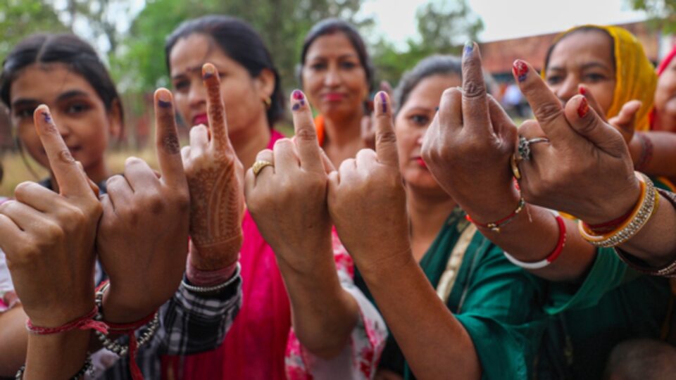 A group of women after exercising their right to vote in the bypolls